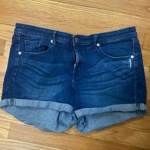 Nassio power stretch mid rise jean shorts size 12